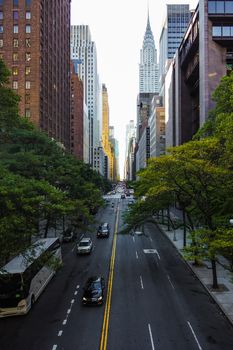 Endless streets of Manhattan New York skyscraper cars