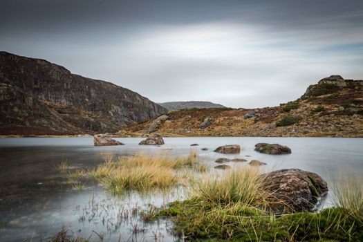 Bad weather water long exposure landscape