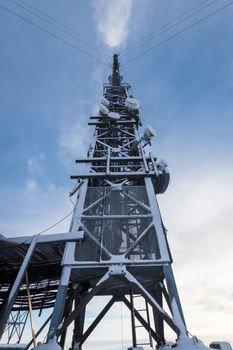 Broadcasting tower steel snow ice covered