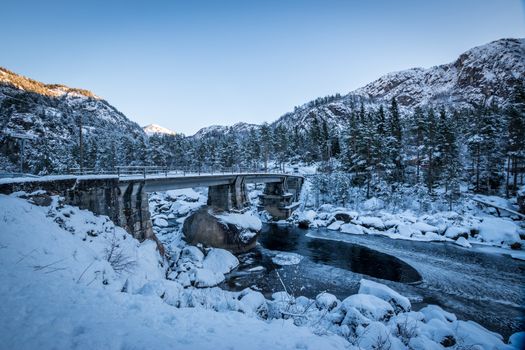 Bridge over river big rock winter