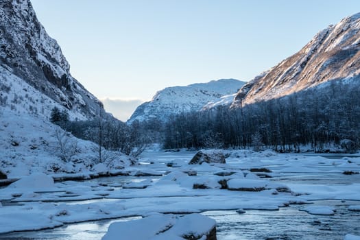 Hunnedalen Norway frozen river valley winter