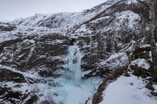 Månafossen frozen snow norway freezing