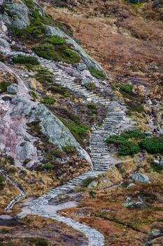 Stone stairs hiking fall landscape Norway Kjerag
