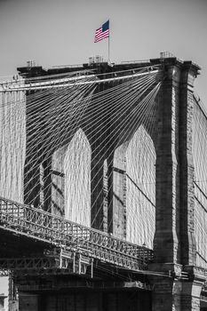 American flag on top of Brooklyn Bridge New York
