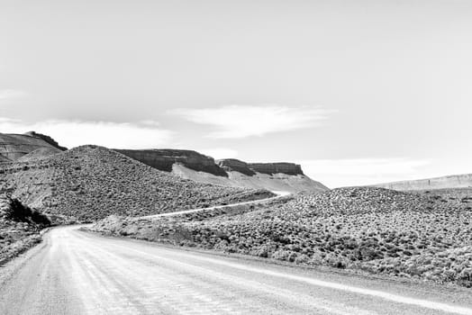 The landscape on road R355 on the Bloukrans Pass between Calvinia and Tankwa Karoo National Park in the Northern Cape Province. Monochrome