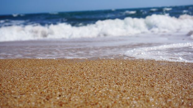 Tropical beach. Ocean wave background. Sand and blue sea. Ocean water nature, beach relax. Summer sea vacation