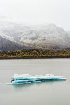 Iceberg in Fjallsarlon glacier lagoon in Vatnajokull National Park, Iceland