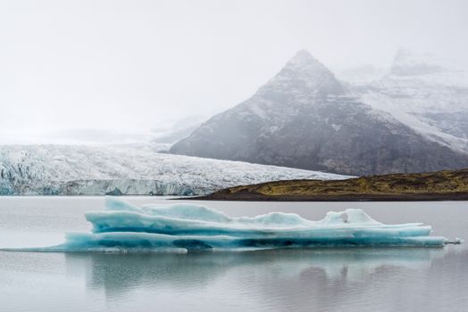 Iceberg in Fjallsarlon glacier lagoon in Vatnajokull National Park, Iceland