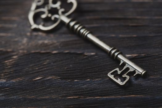 Vintage skeleton key on a table. Close-up