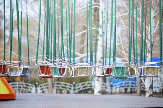 Empty chain swing in amuzement park