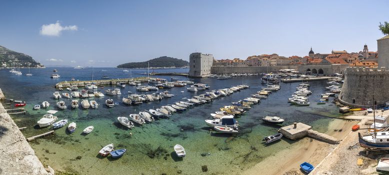 Dubrovnik, Croatia - 07. 13. 2018. Fort St. Ivana and Old Port in Dubrovnik, Croatia, panoramic view on a sunny summer day.