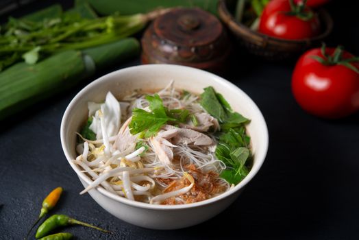 Indonesian chicken and rice noodle soup.