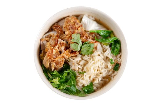 Asian ramen noodles soup with vegetables and chicken in bowl. Top view flat lay isolated on white background.