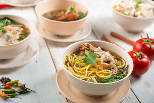 Various Southeast Asian dishes, noodles and soup.