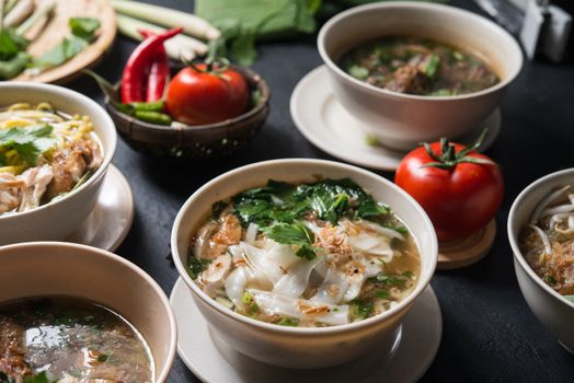 Various Southeast Asian dishes, noodles and soup.