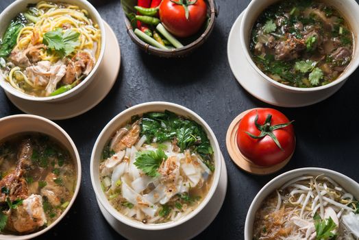 Various Southeast Asian dishes, noodles and soup.