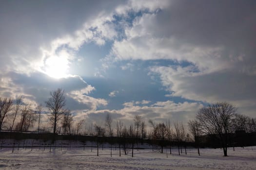 View of the park at the end of winter, at the beginning of spring in a sunny day