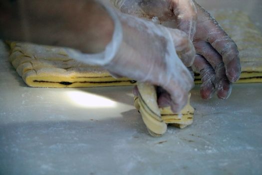 woman's hands making cookies for the holiday