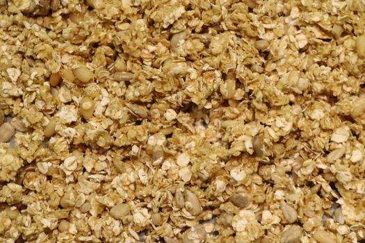 Organic homemade Granola Cereal with oats and almond. Texture oatmeal granola or muesli as background. Top view or flat-lay. Copy space for text