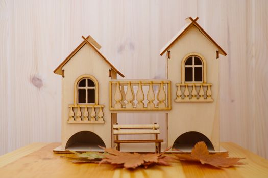 wooden house model with background of starting construction house ,my house concept