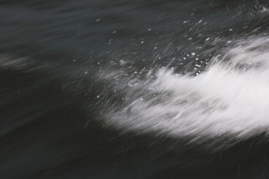 Blur abstract background. Water spray from a boat or ship