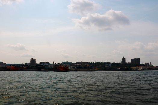 View of the city on a cloudy day from the water