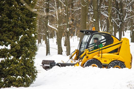 snow machine is on the street during the day