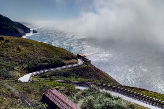 Beautiful road along the Pacific Ocean on a sunny day