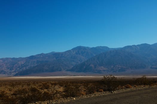 The road through Death Valley National Park, with the Panamint Mountains in the background