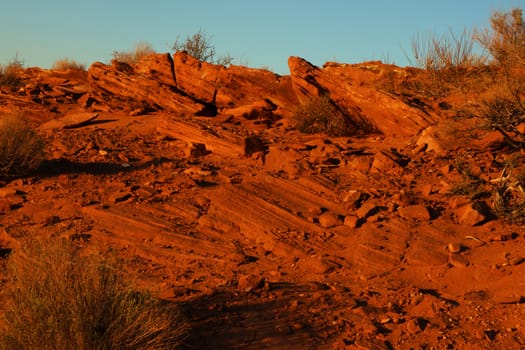 Sandstone desert landscape Arizona. Photo taken at the Horseshoe Bend National Park. The texture of the sand and stone creates color palette in the desert