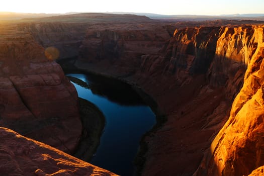 Beautiful view of the Horseshoe Bend, Arizona, under warm sunset light