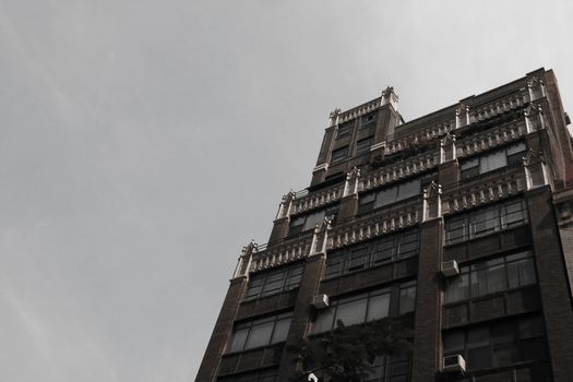 Wall of the house with fire stairs in downtown New York, USA