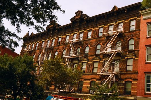 Wall of the house with fire stairs in downtown New York, USA