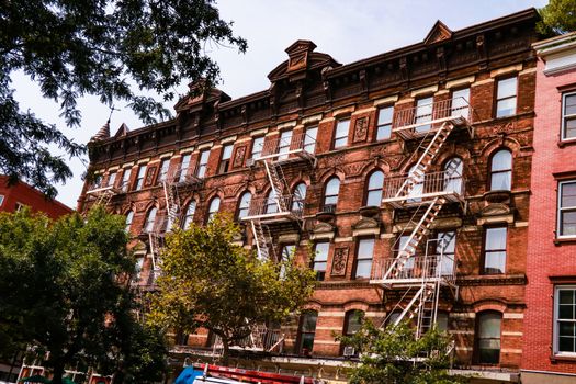 Wall of the house with fire stairs in downtown New York