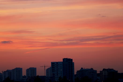 Beautiful sunset in the city with a view of the house