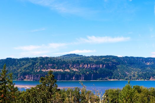 View of the mountains and the river on a sunny day in America.