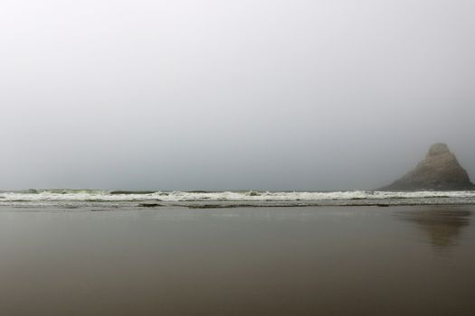 Gorgeous Oregon coast with a view on Pacific Ocean in a foggy day.