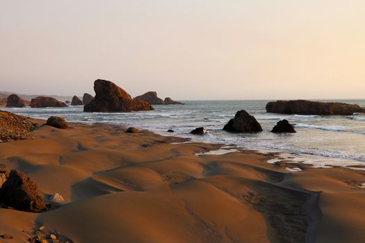 Amazing sunset on the beach, near the Pacific Ocean, California.