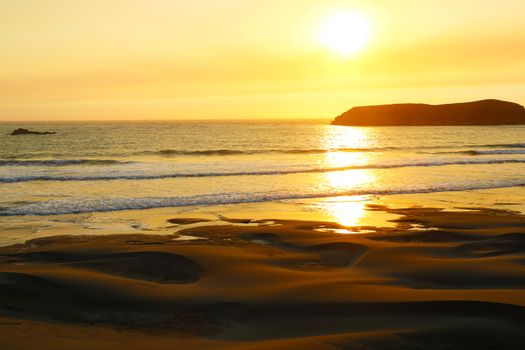 Golden Sunset Landscape Over Pacific Ocean Waters.