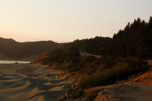The road along the sandy beach of the Pacific Coast.