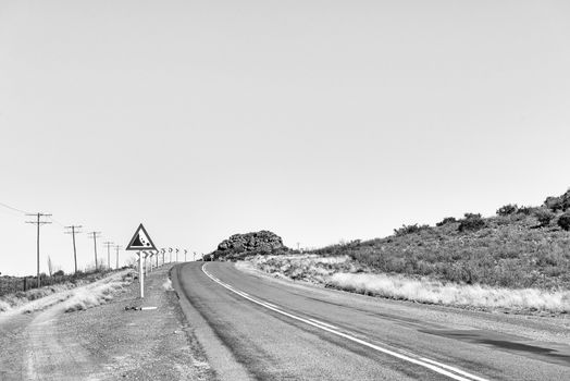 A view of road R48 at Modderfontein between Phillipstown and De Aar in the Northern Cape Province. Monochrome