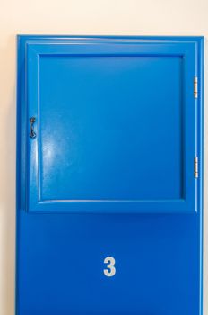Blue small cabinet door collection with numeral