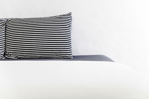 Closeup Modern style bedroom with pillows on bed