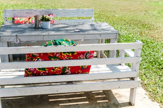 Image of Empty table in the house's garden.