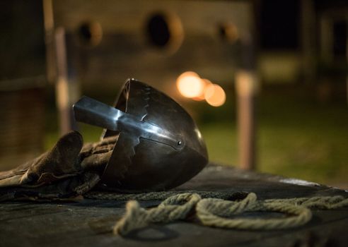 medieval tools, helmet, wood, rope, gloves