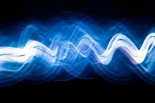 Sound waves in the visible blue color in the dark