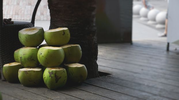 Sweet green coconuts. Coconut tropical fruit for drink in China