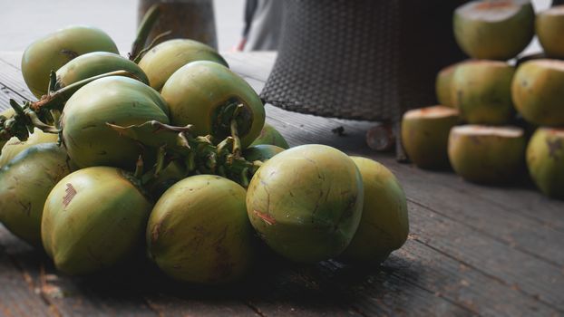 Sweet green coconuts. Coconut tropical fruit for drink in China