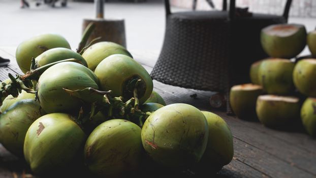 Sweet green coconuts. Coconut tropical fruit for drink in China