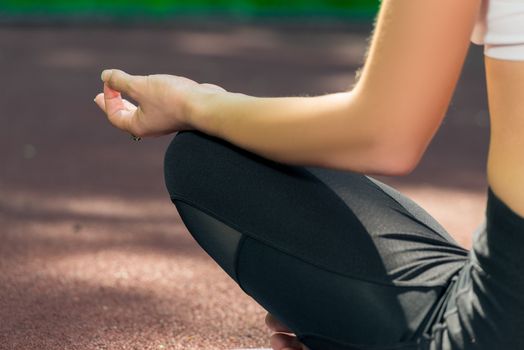 lotus pose yoga asana - hand close up